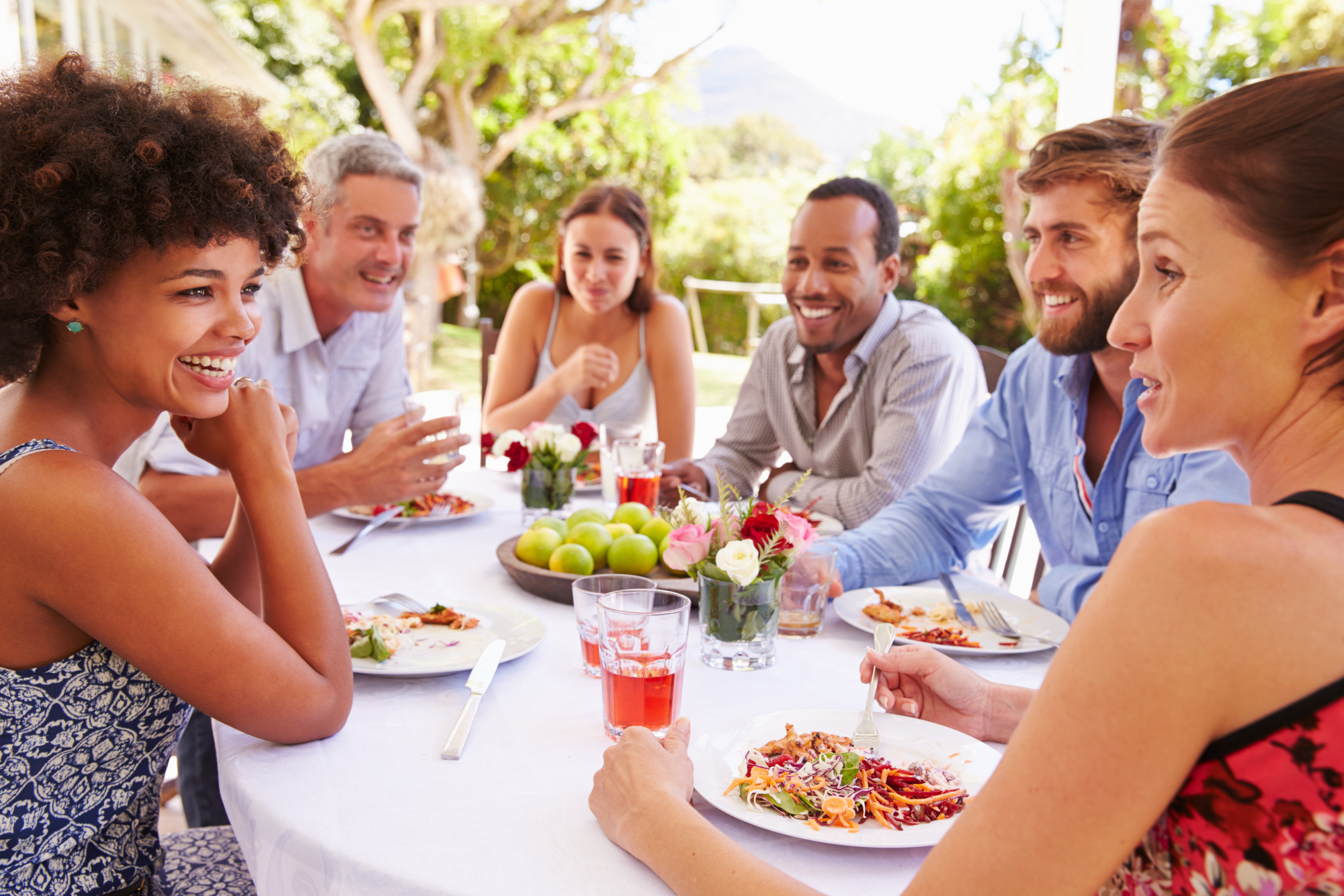 Friends having dinner together outside